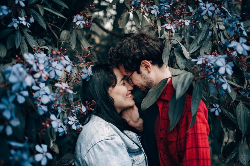 Couples smiling at each other - premarital counseling advice.
